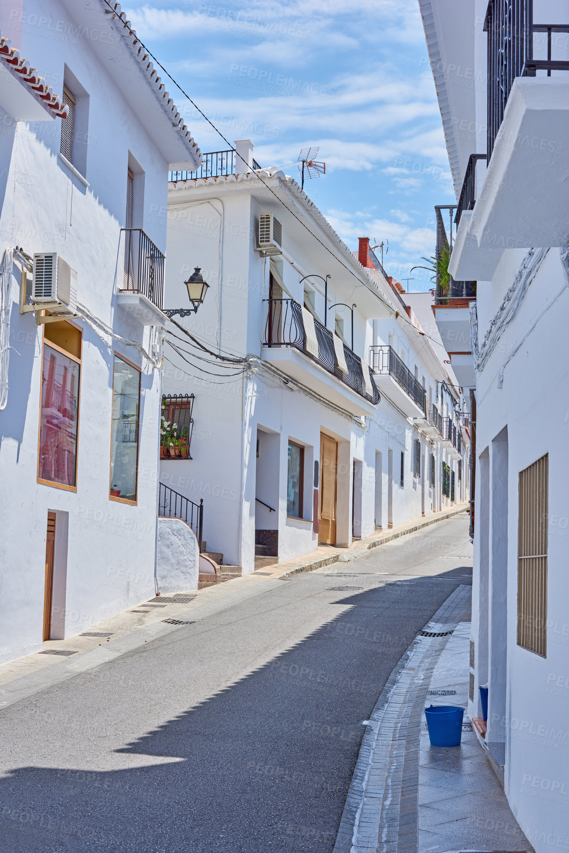 Buy stock photo Street, mountain and travel with old city, holiday and adventure with vacation, Frigiliana and Andalusia. Spain, empty and buildings with architecture, outdoor and road with journey, sky and holiday