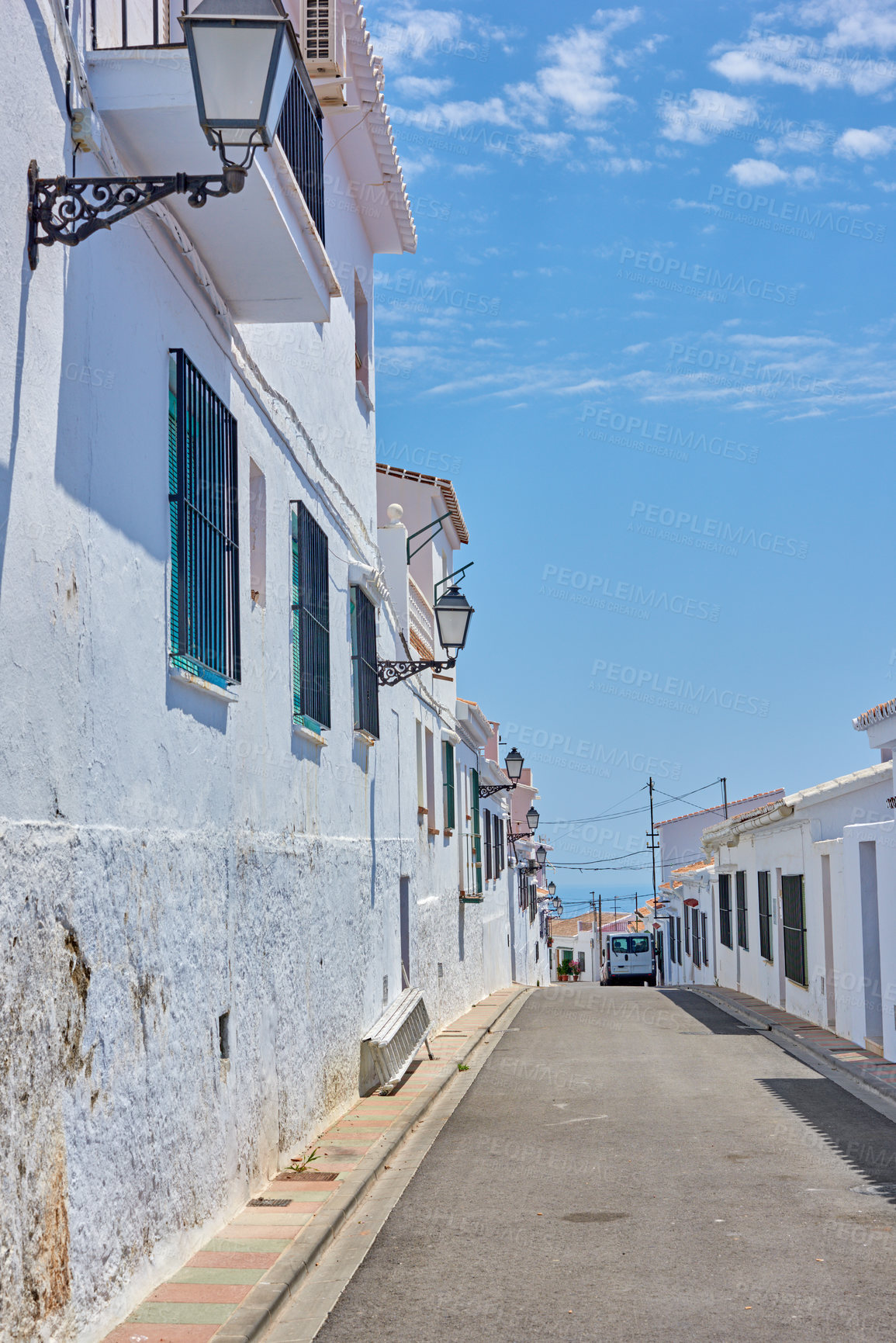 Buy stock photo Street, blue sky and travel with old city, vacation and adventure with nature, Frigiliana and Andalusia. Spain, empty and buildings with architecture, outdoor and road with journey and seaside town