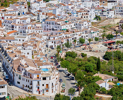 Buy stock photo Outdoor, buildings and city for travel, destination or holiday in Andalusia with vintage architecture. Location, nature and ancient houses in village or town for vacation, getaway or trip in Spain.