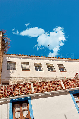 Buy stock photo Ancient, house and architecture of building design for village travel, history tourism and vintage location. Above, blue sky and wall structure of traditional culture, holiday and Spain destination