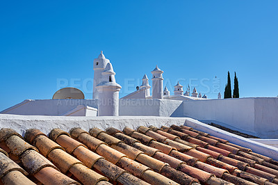 Buy stock photo Beautiful chimneys and ventilation tubes in the city of Colahonda, Andalusia, Spain