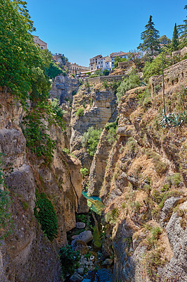 Buy stock photo Outdoor, buildings and village in nature, valley and architecture of homes, sky and neighbourhood. Cliff, travel and peace of countryside, property and history of real estate, scenery and Spain