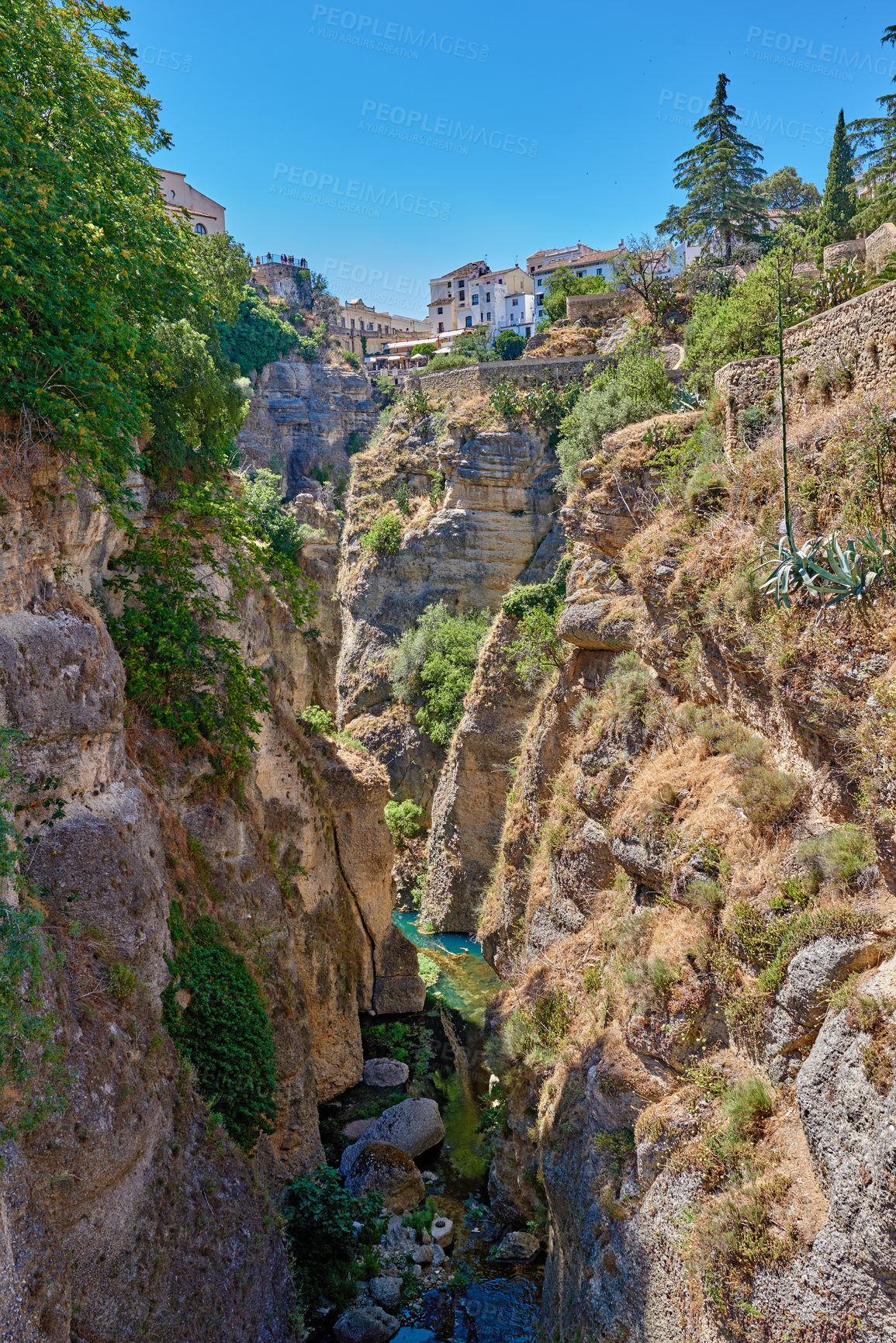 Buy stock photo Outdoor, buildings and village in nature, valley and architecture of homes, sky and neighbourhood. Cliff, travel and peace of countryside, property and history of real estate, scenery and Spain