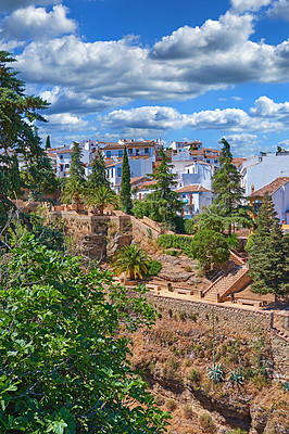 Buy stock photo Outdoor, buildings and village in nature, trees and architecture of homes, sky and neighbourhood. Cliff, travel and peace of countryside, property and history of real estate, scenery and Spain