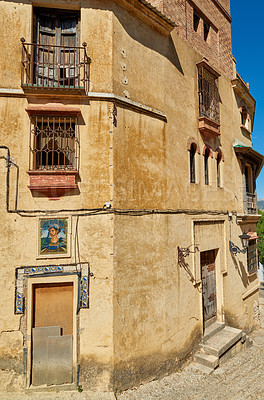 Buy stock photo Ancient, buildings and house architecture in city with wall structure, travel location and history tourism. Abandoned, property or window view, balcony fence and vintage neighborhood of Spain holiday