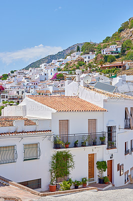 Buy stock photo Outdoor, buildings and valley in nature, mountain and architecture of homes, sky and neighbourhood. Cliff, travel and peace of countryside, property and history of real estate, scenery and Spain