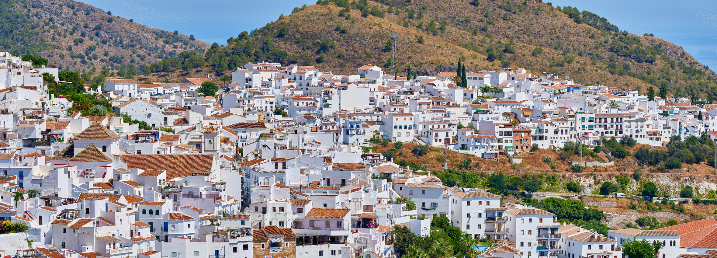 Buy stock photo Outdoor, buildings and village in nature, cliff and architecture of homes, sky and neighbourhood. Mountain, travel and peace of countryside, property and history of real estate, scenery and Spain