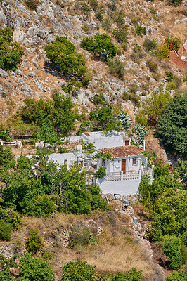 Buy stock photo Outdoor, house and village in nature, mountain and architecture of home, sky or environment of landscape. Cliff, travel and peace of countryside, property and history of real estate, scenery or Spain