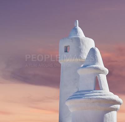 Buy stock photo Chimney, sunset and architecture in city for wallpaper, buildings or village design for ventilation in Spain. Colahonda, stone structure or sky background on coast for heritage or whitewash aesthetic