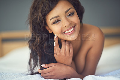 Buy stock photo Shot of a gorgeous young woman posing seductively in her bedroom