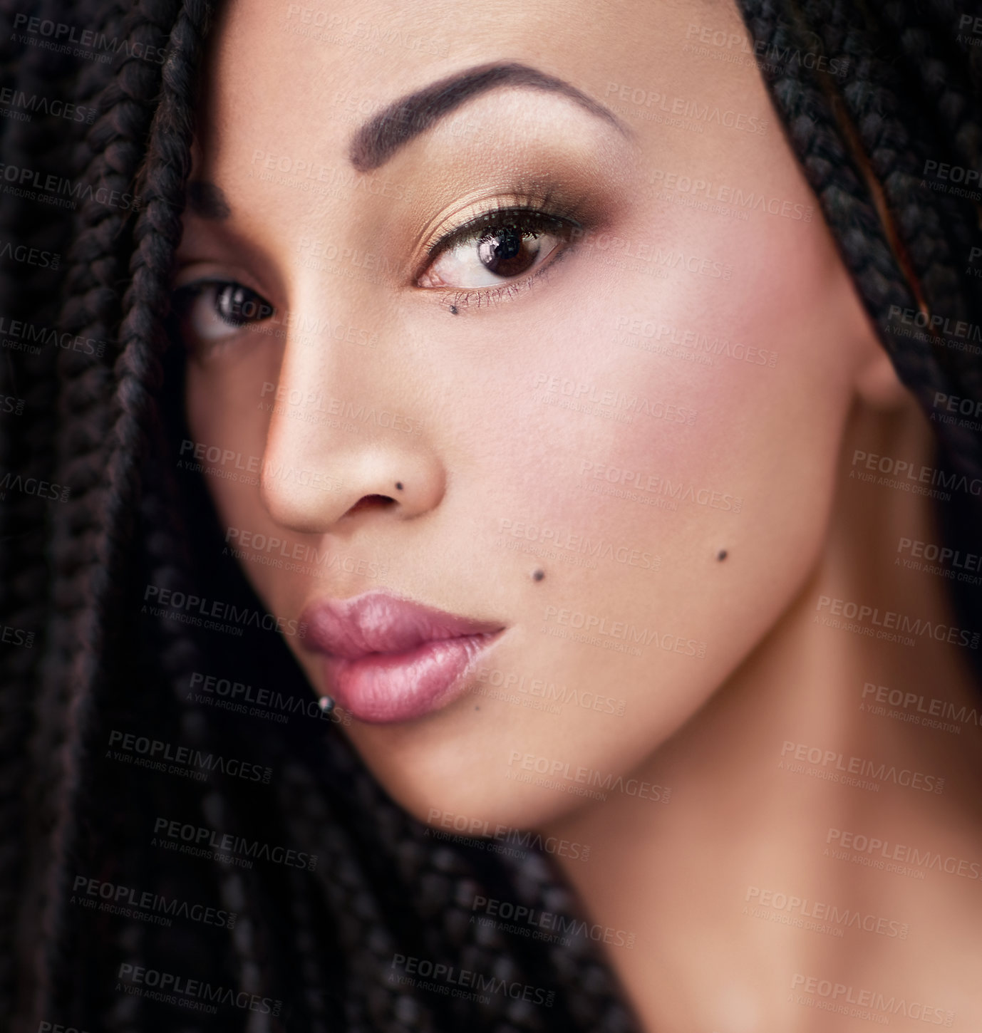 Buy stock photo African woman, makeup and beauty in portrait for confidence, glow or foundation for cosmetics. Girl, model and person with lipstick, braids and shine with piercing, aesthetic or facial transformation