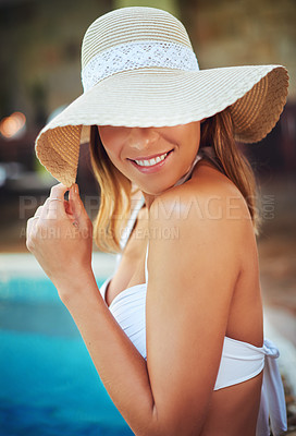 Buy stock photo Relax, swimming pool and woman at hotel with hat, holiday and calm summer weekend in swimwear. Peace, water and happy girl at luxury spa for cool vacation with hospitality, health and wellness.