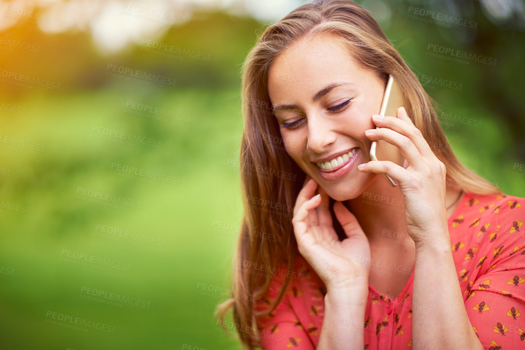 Buy stock photo Woman, phone call and talking with smile in nature, communication and speaking with virtual contact in park. Mockup space, happiness and online conversation or outside, connection and discussion