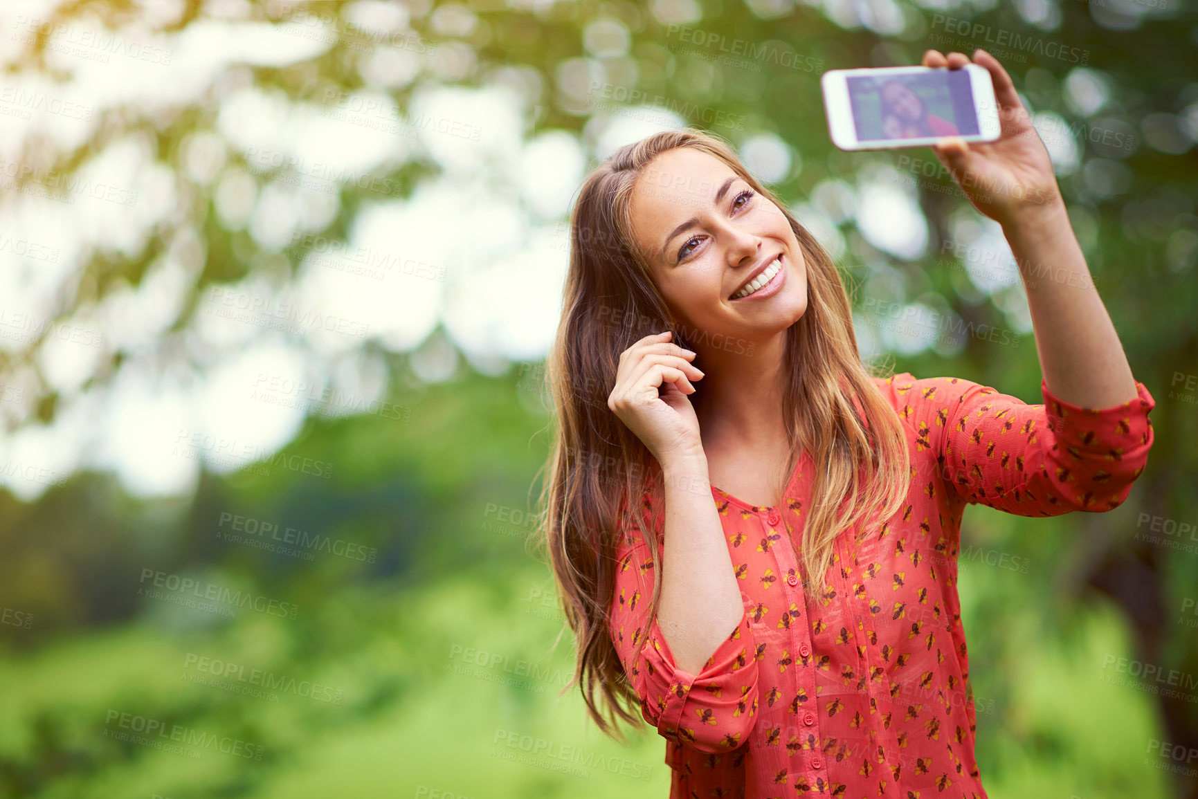 Buy stock photo Woman, outside and selfie memory in park, happiness and photography in nature or smiling on weekend break. Social media, blog update and confident on summer holiday, garden and screen in Canada
