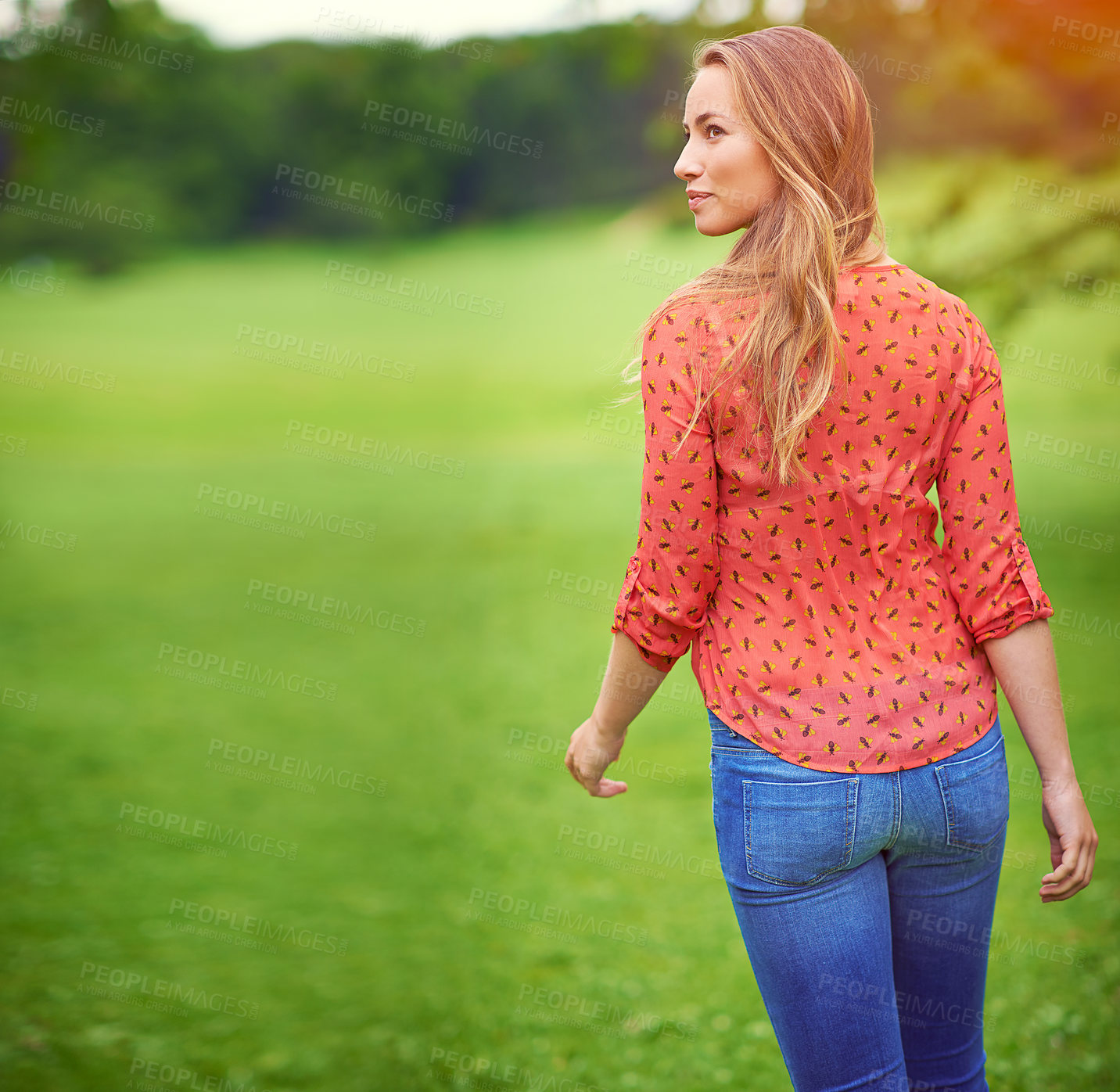 Buy stock photo Woman, thinking and relax outdoor in nature, holiday countryside and pondering in garden. Female person, walking and profile in park for contemplating, vacation and travel for reflection on trip