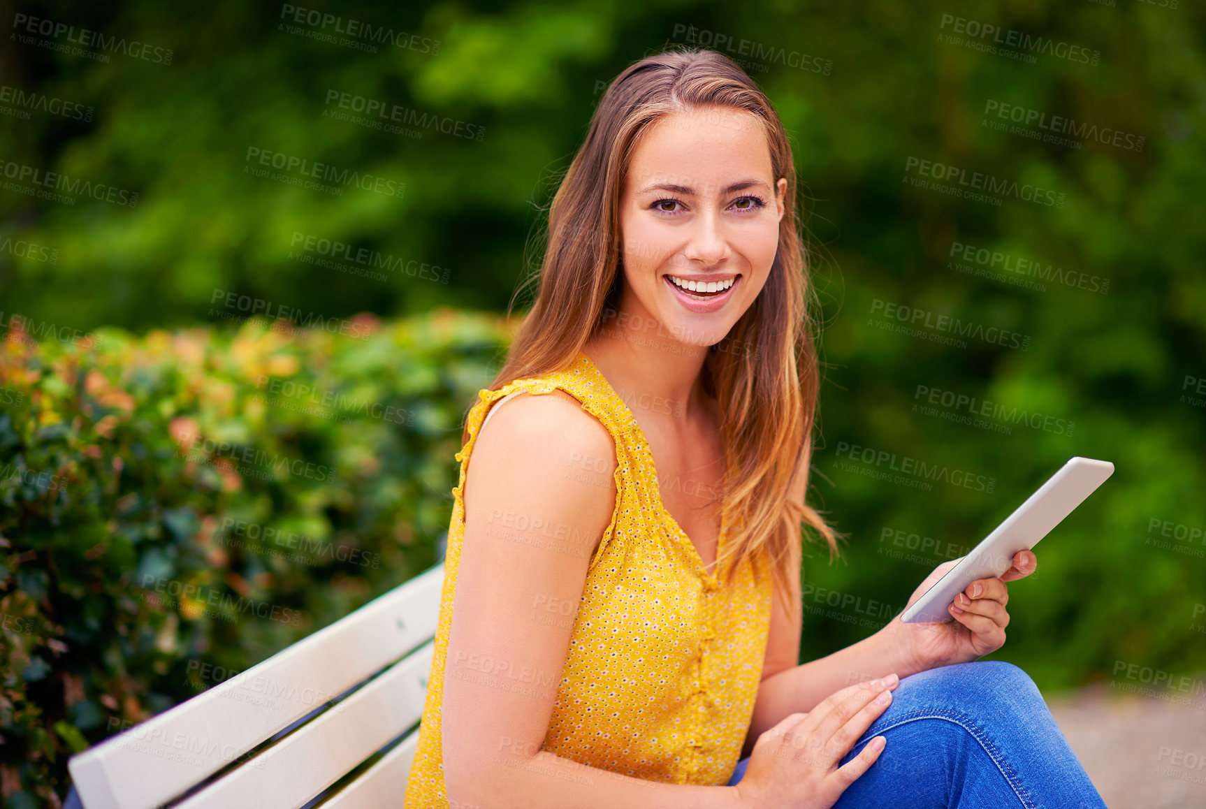 Buy stock photo Portrait, woman and tablet in park for reading, research and networking for school project. College student, happy and technology on bench or campus for social media, connection and online or ebook