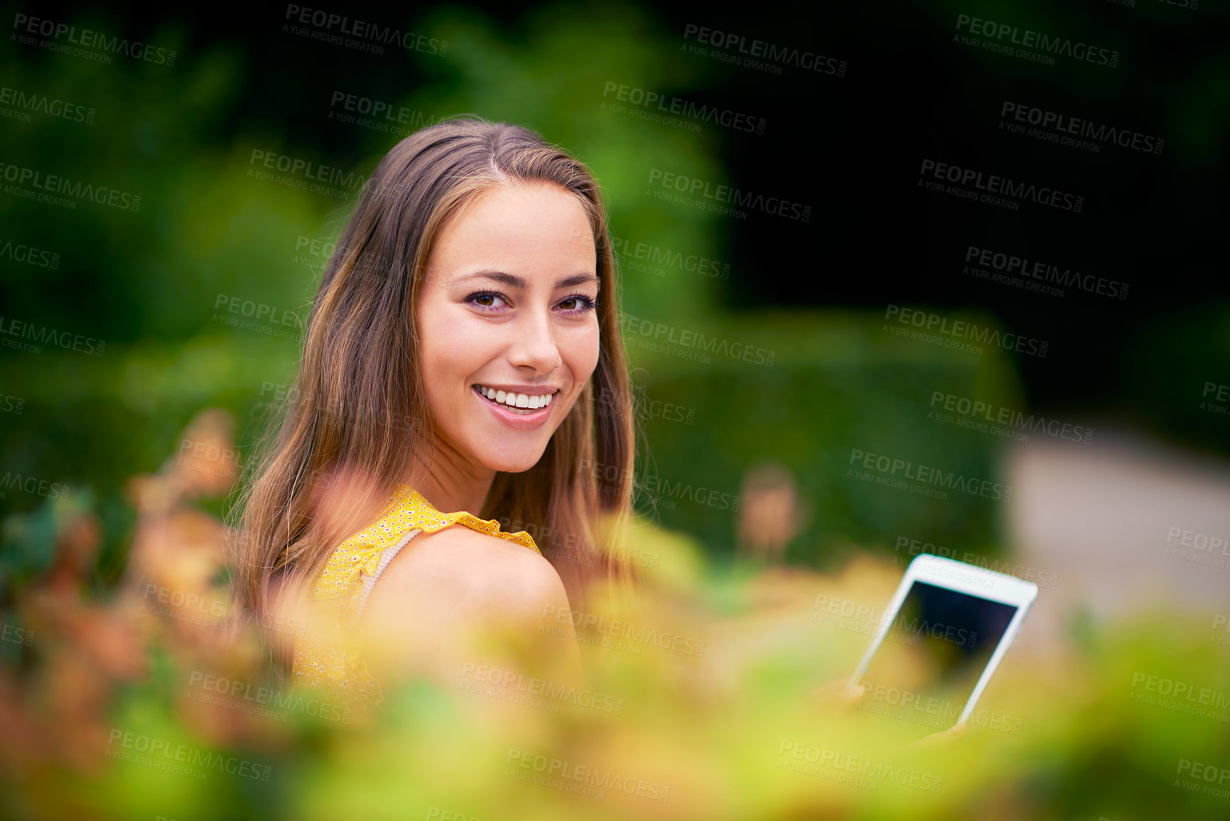 Buy stock photo Portrait, woman and happy in park with tablet, reading and networking for school project. College student, smile and technology or screen in garden for social media, communication or online for ebook
