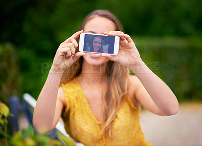 Buy stock photo Phone, woman and screen for outdoor selfie for social media post in nature, park and garden on vacation. Hands, girl and female person live streaming for holiday update, pictures and photo online