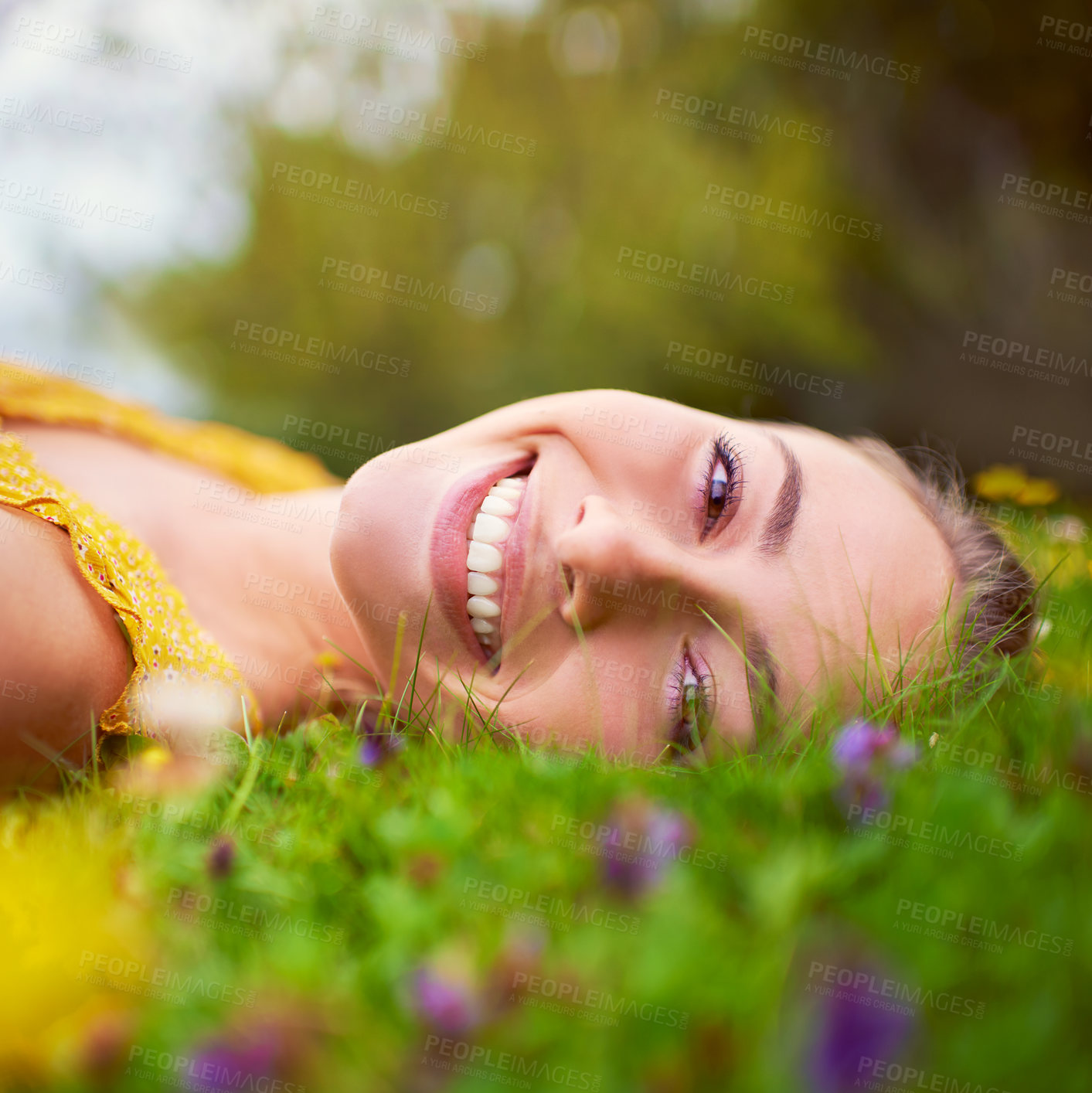 Buy stock photo Happy woman, portrait and relax on field in outdoor, travel and countryside nature for peace or calm. Female person, rest and meadow for wellness, spring garden and flowers in park on holiday trip