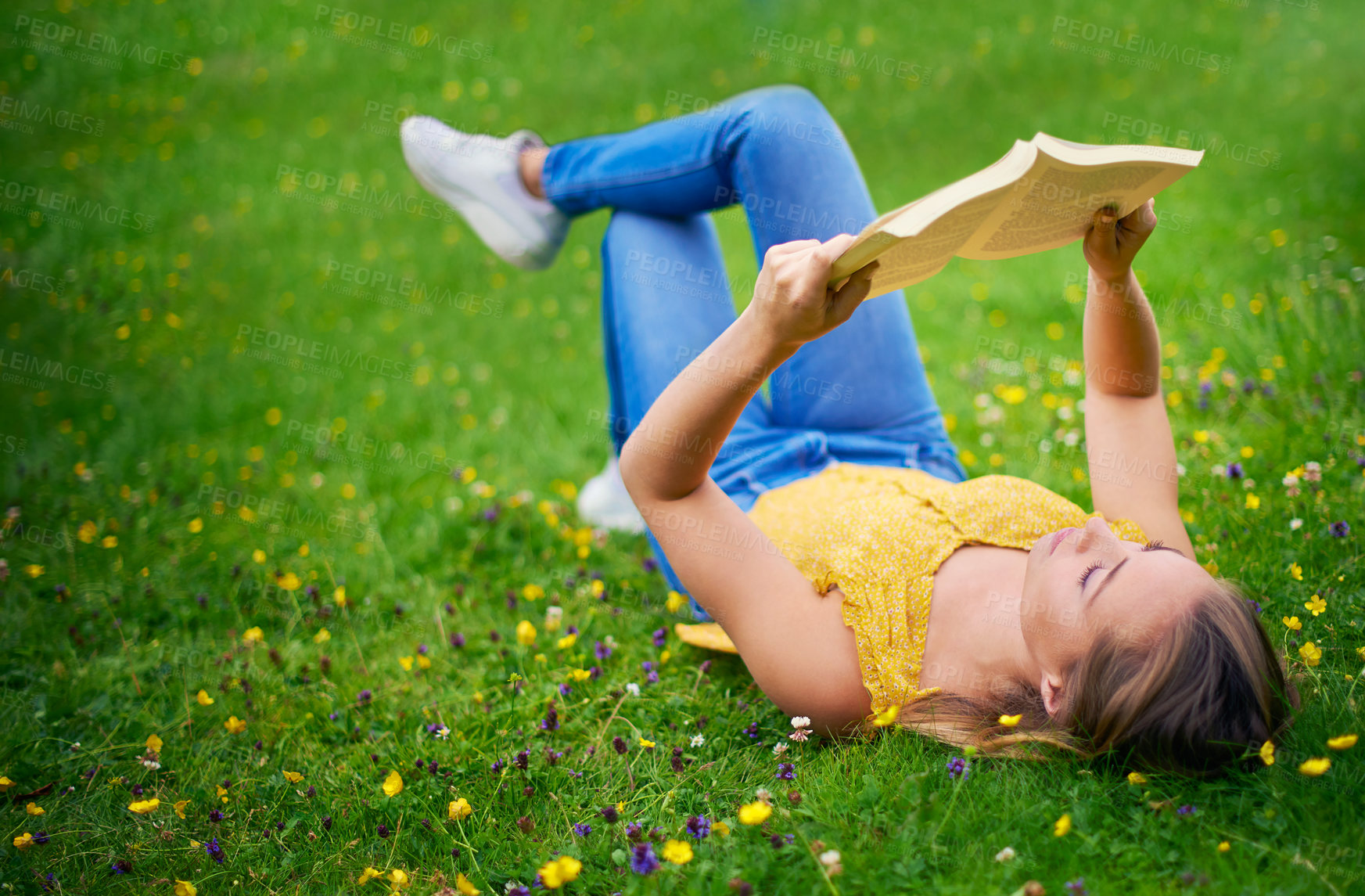 Buy stock photo Nature, reading book and woman relax on grass for learning, knowledge or weekend break. University, student and female person lying in field with hobby for literature, comfortable or peace in garden