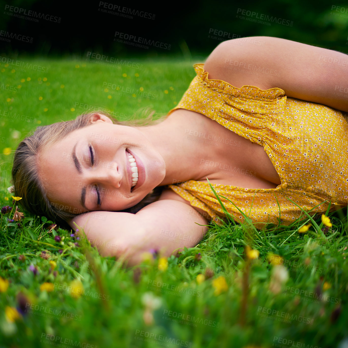 Buy stock photo Woman, sleep and relax on grass field in outdoor, travel and countryside nature for peace or calm. Female person, rest and meadow for wellness, garden dream and flowers in park on holiday weekend