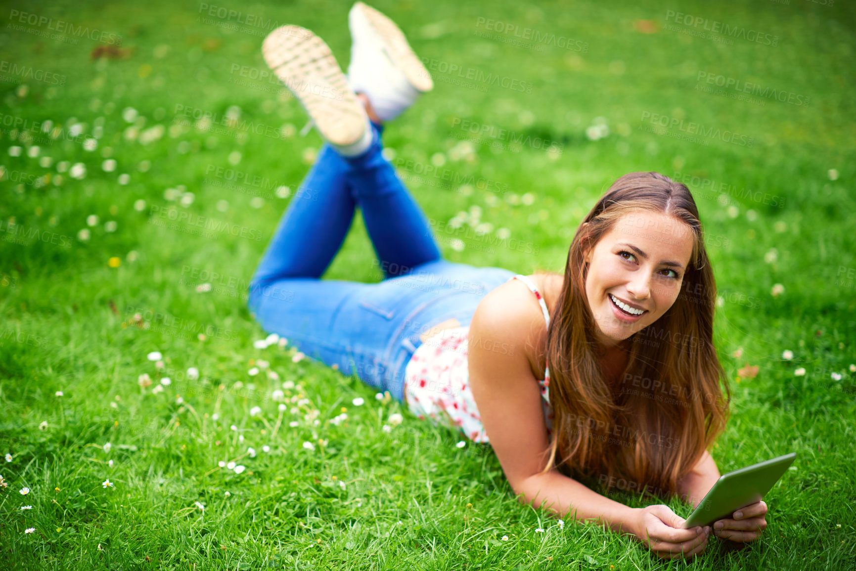 Buy stock photo Thinking, happy and woman in park on tablet for website, social networking and online on grass. Smile, nature and person in field with digital tech for communication, contact and internet outdoors