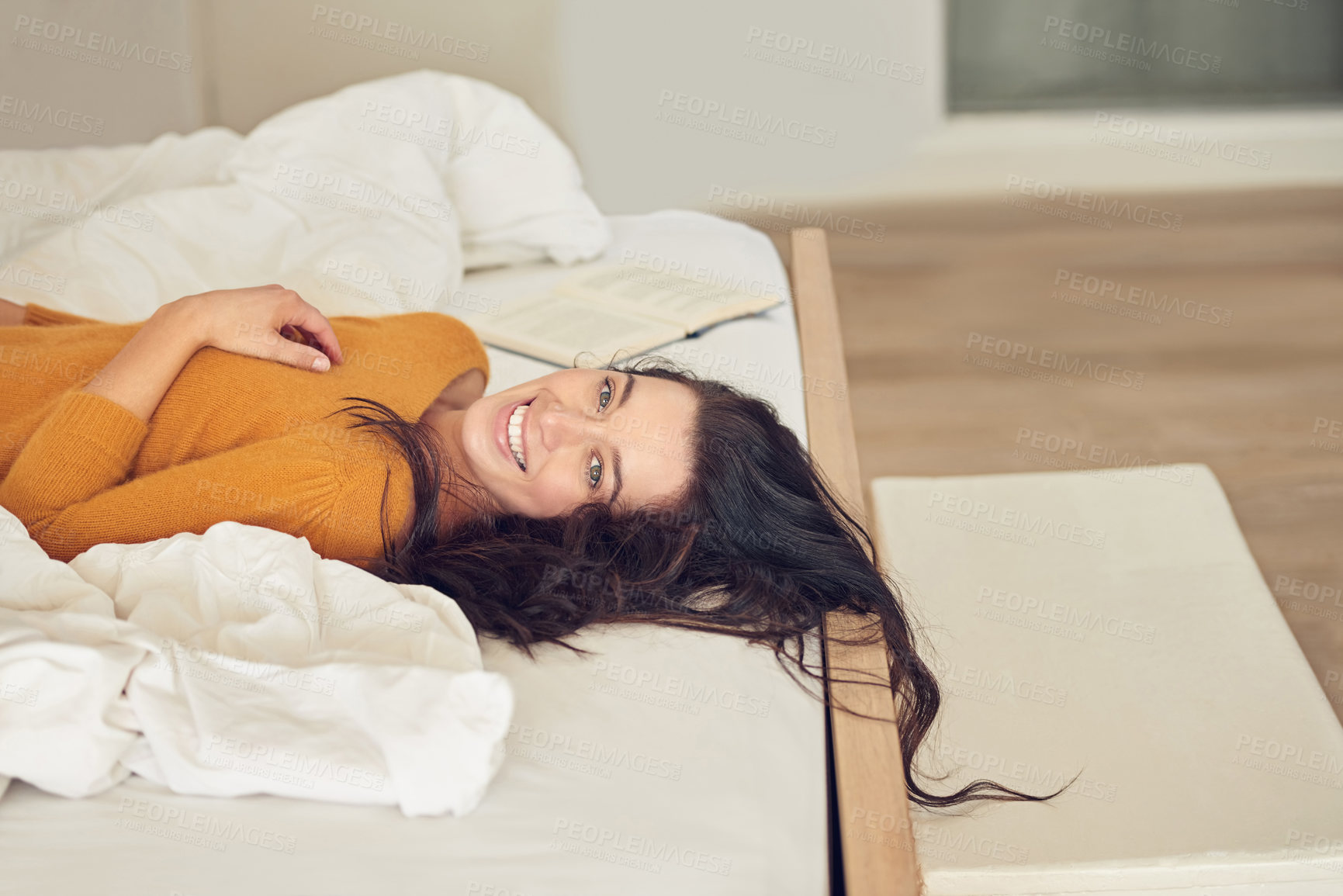 Buy stock photo Woman, portrait and happy on bed for relax, comfort and break with day off on weekend after wake up. Female person, face and smile in apartment for mental health, peace and self care in morning