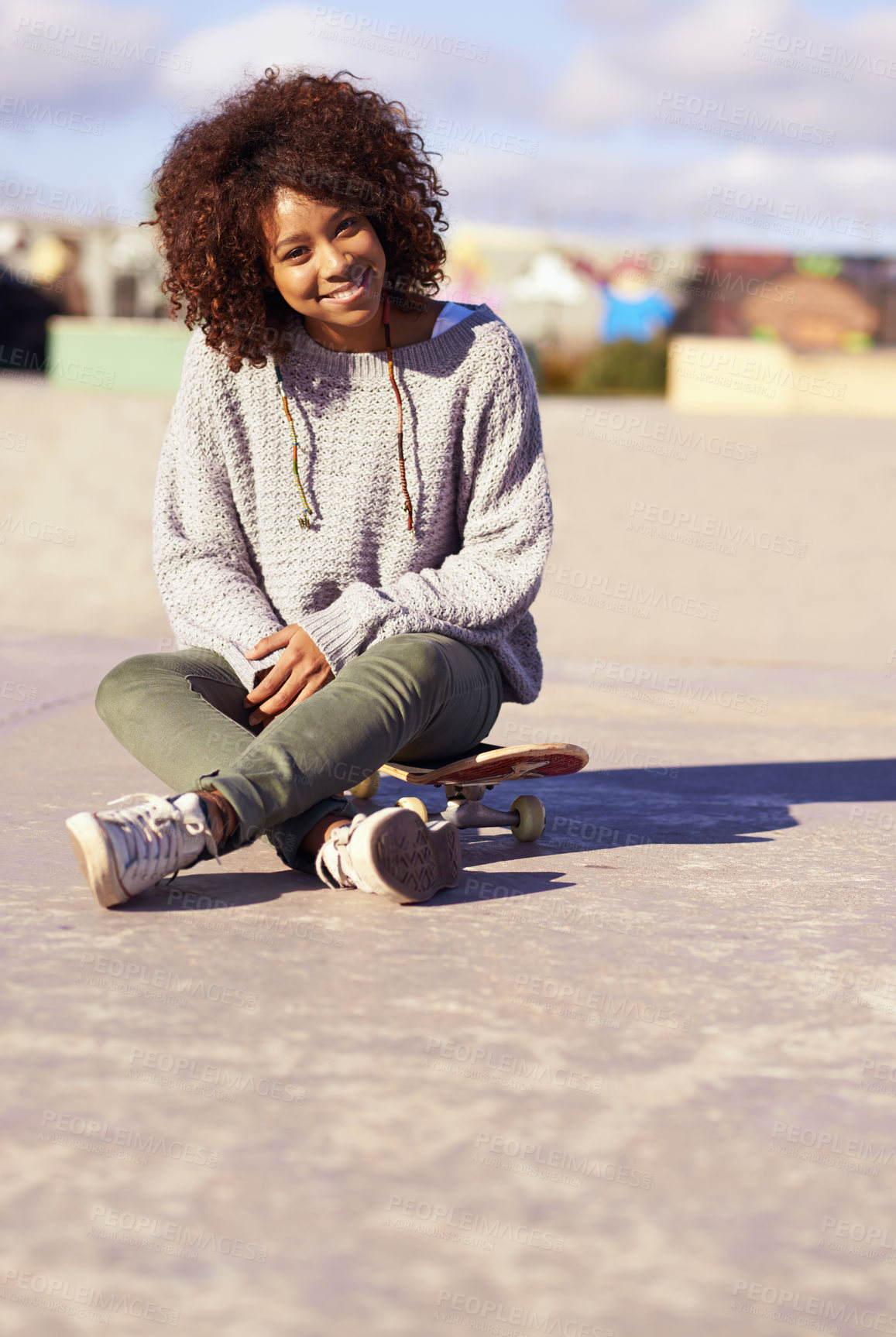Buy stock photo Portrait, smile and woman at skate park in city in summer for sport, hobby or relax outdoor. Happy person, skateboard and gen z girl in casual clothes for fashion on mockup space in South Africa