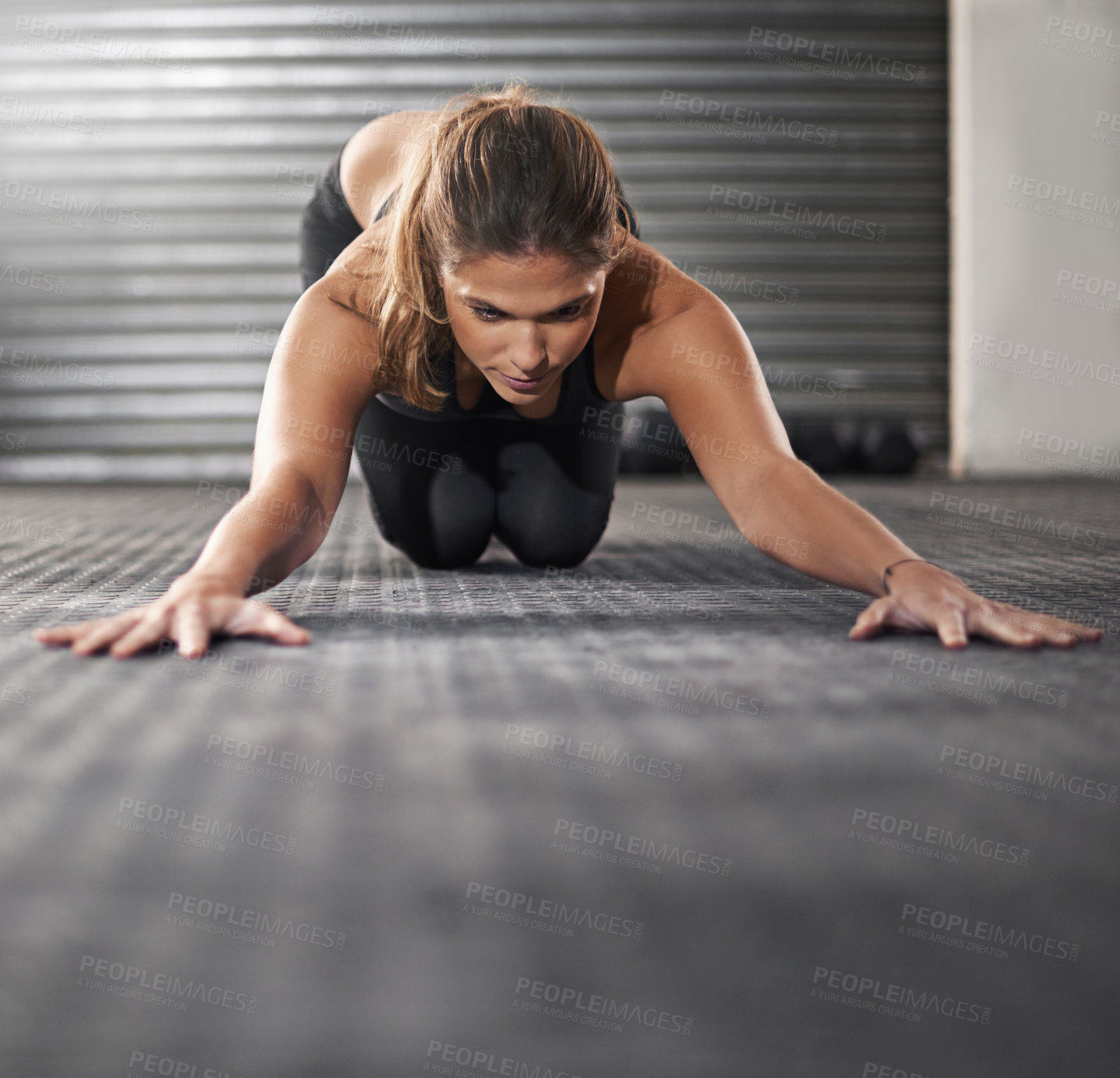 Buy stock photo Woman, gym and floor with stretching for balance with mission, exercise or fitness for health. Female person, body and peace for wellness with training, commitment to sport or workout with arms