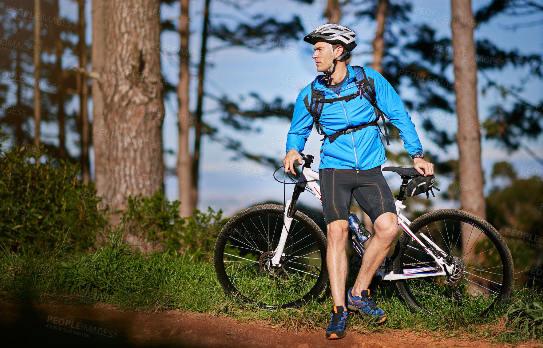 Buy stock photo Cyclist, thinking and bicycle in woods for adventure and transport for outdoor journey. Man, helmet and ideas or inspiration for fitness, wellness or route in forest or nature for exercise and health