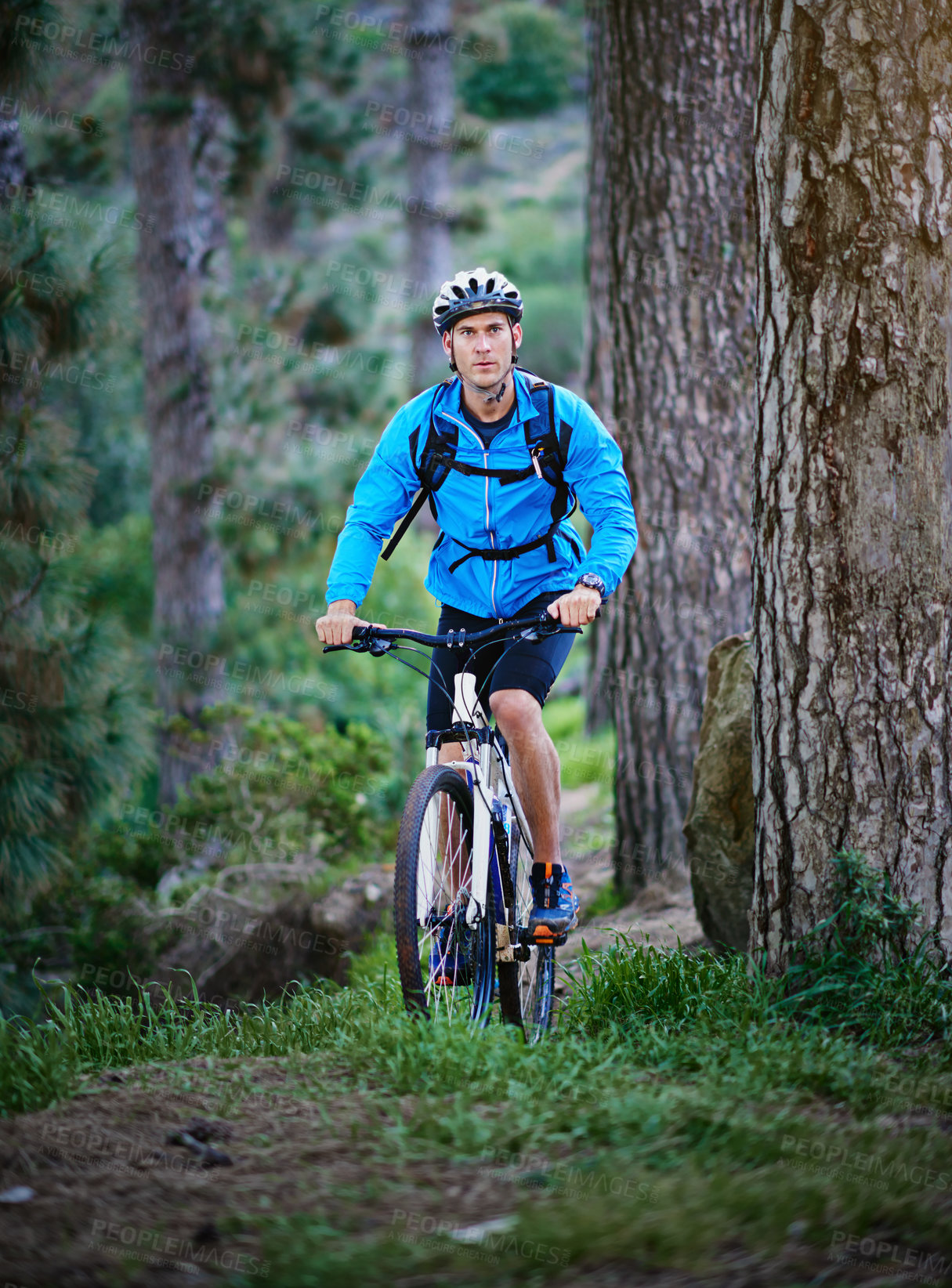 Buy stock photo Man, cycling and mountain bike in forest with helmet, mud and off road for fitness, adventure and health. Cyclist, bicycle and exercise outdoor in nature for workout, sports and training with trees