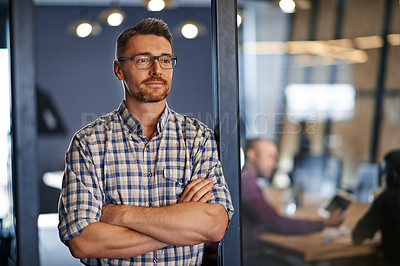 Buy stock photo Shot of an office worker looking thoughtful