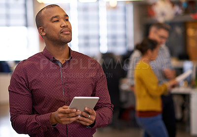 Buy stock photo Cropped shot of an office worker looking thoughtful while holding a digital tablet
