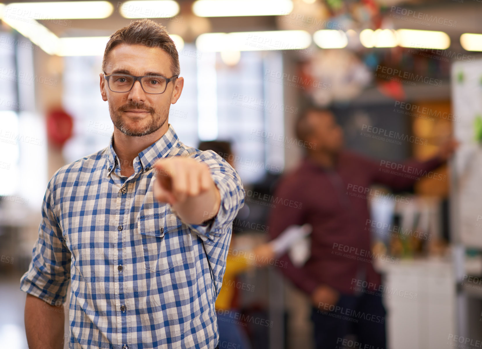 Buy stock photo Cropped shot of a mature businessman pointing at the camera