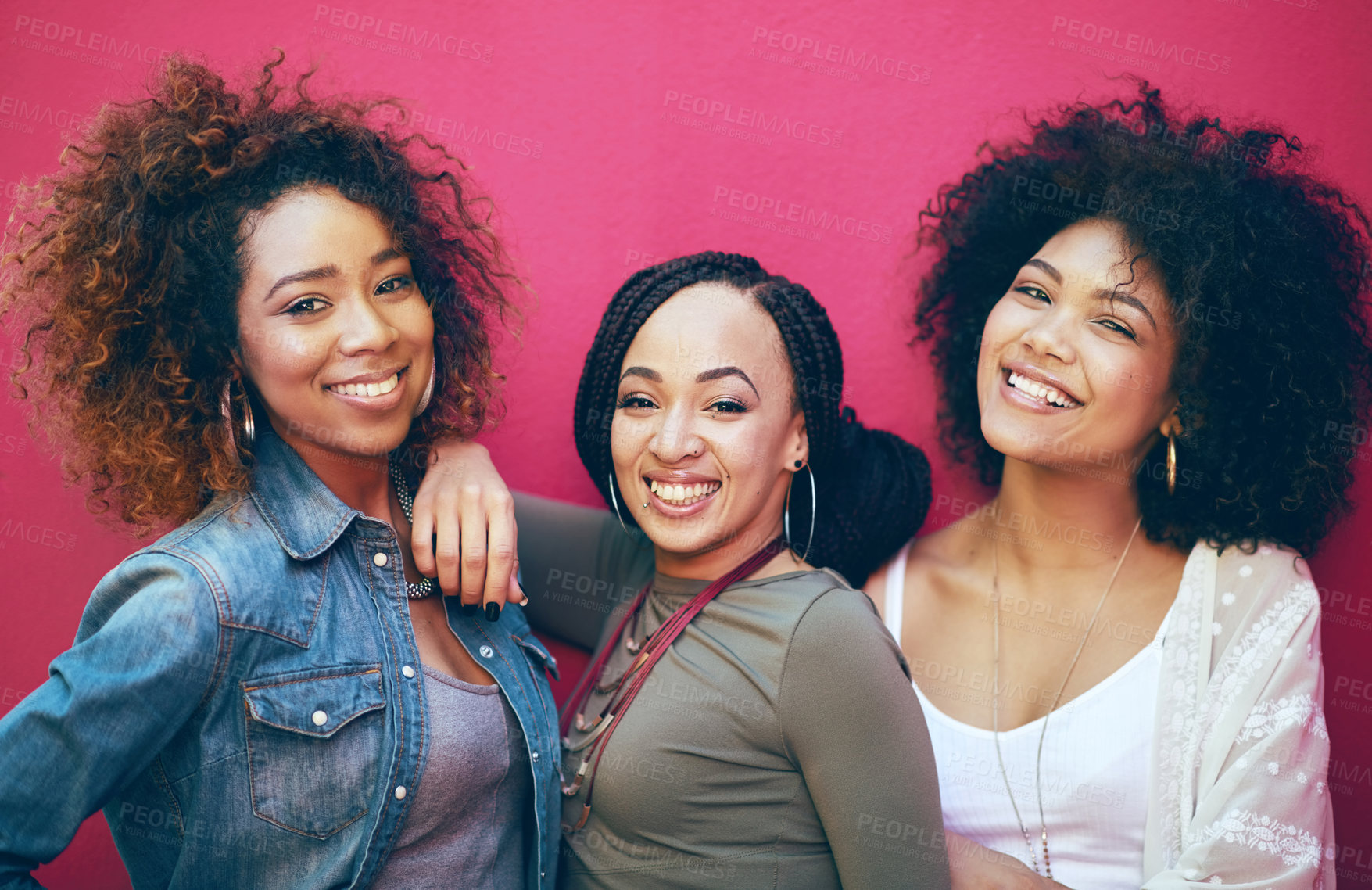 Buy stock photo Portrait of a group of female friends posing against a pink background