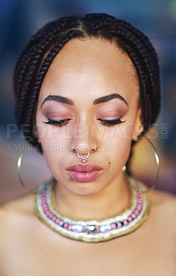 Buy stock photo Cropped shot of an attractive young woman with piercings