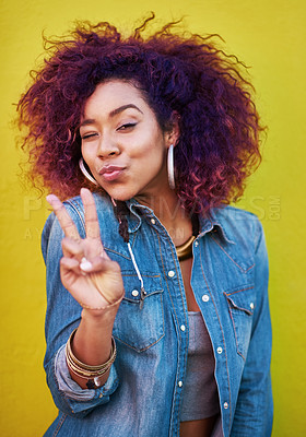 Buy stock photo Studio, portrait and girl with wink, peace sign and isolated by yellow background. Fashion model, streetwear and jewelry with stylish outfit, v symbol and emoji with pout expression or personality