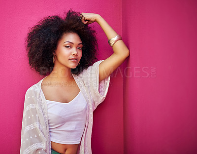 Buy stock photo Portrait of an attractive young woman posing against a pink background