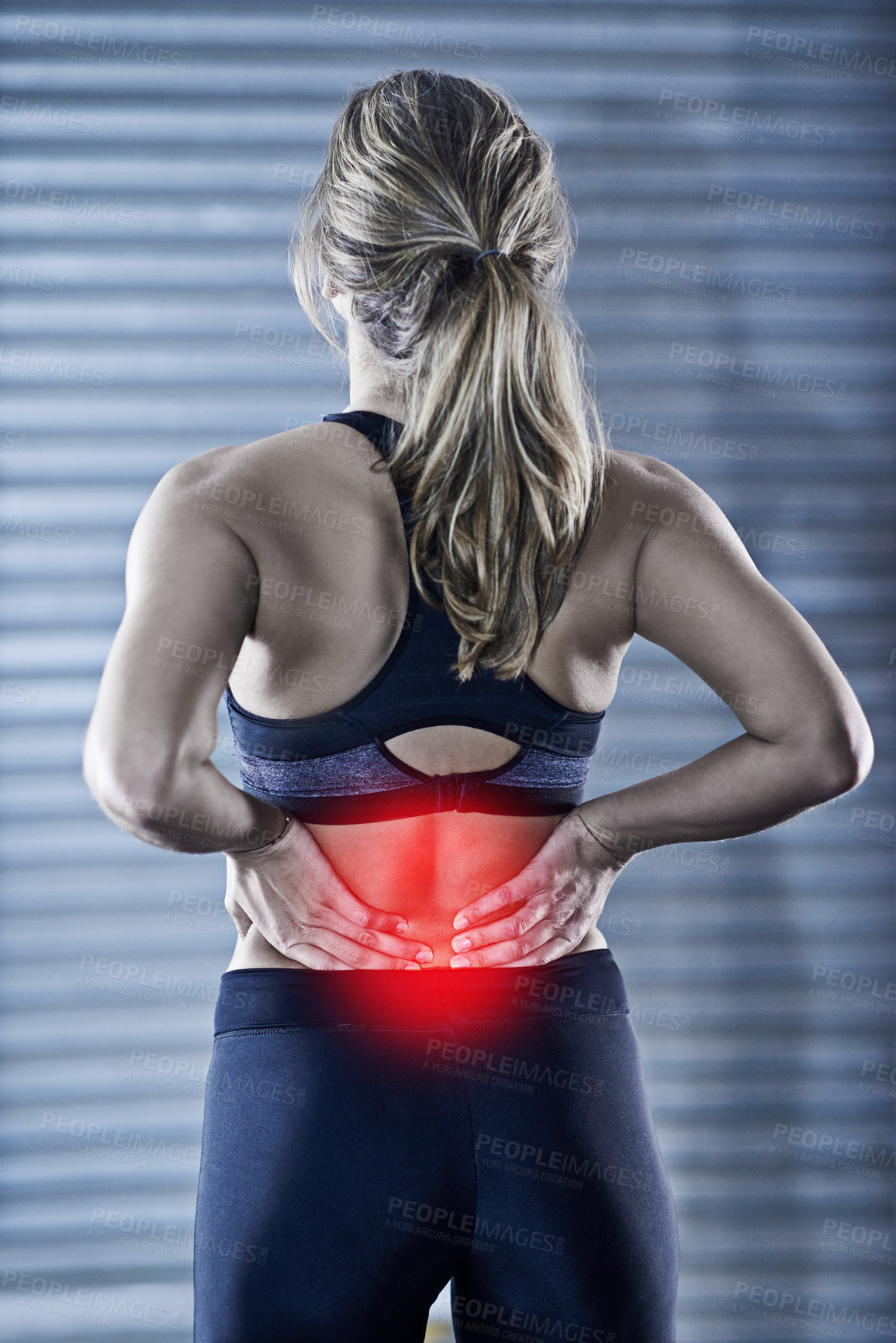 Buy stock photo Woman, fitness and back injury with red glow for pain, accident or bruise after workout or exercise at gym. Rear view of female person with sore spine, ache or inflammation for hurt joint or muscle