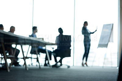 Buy stock photo Blur view of presentation, training and motivation in office boardroom with manager, leader and boss using board. Group or team of meeting colleagues planning strategy, learning or gaining new skills