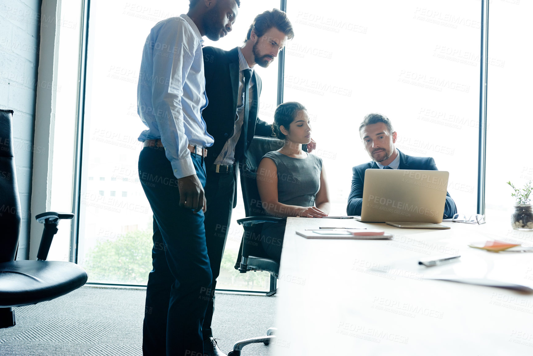 Buy stock photo Teamwork, trust and good leadership during a meeting while using a laptop for innovation and marketing research in an office. Corporate and motivated businesspeople discussing their company vision