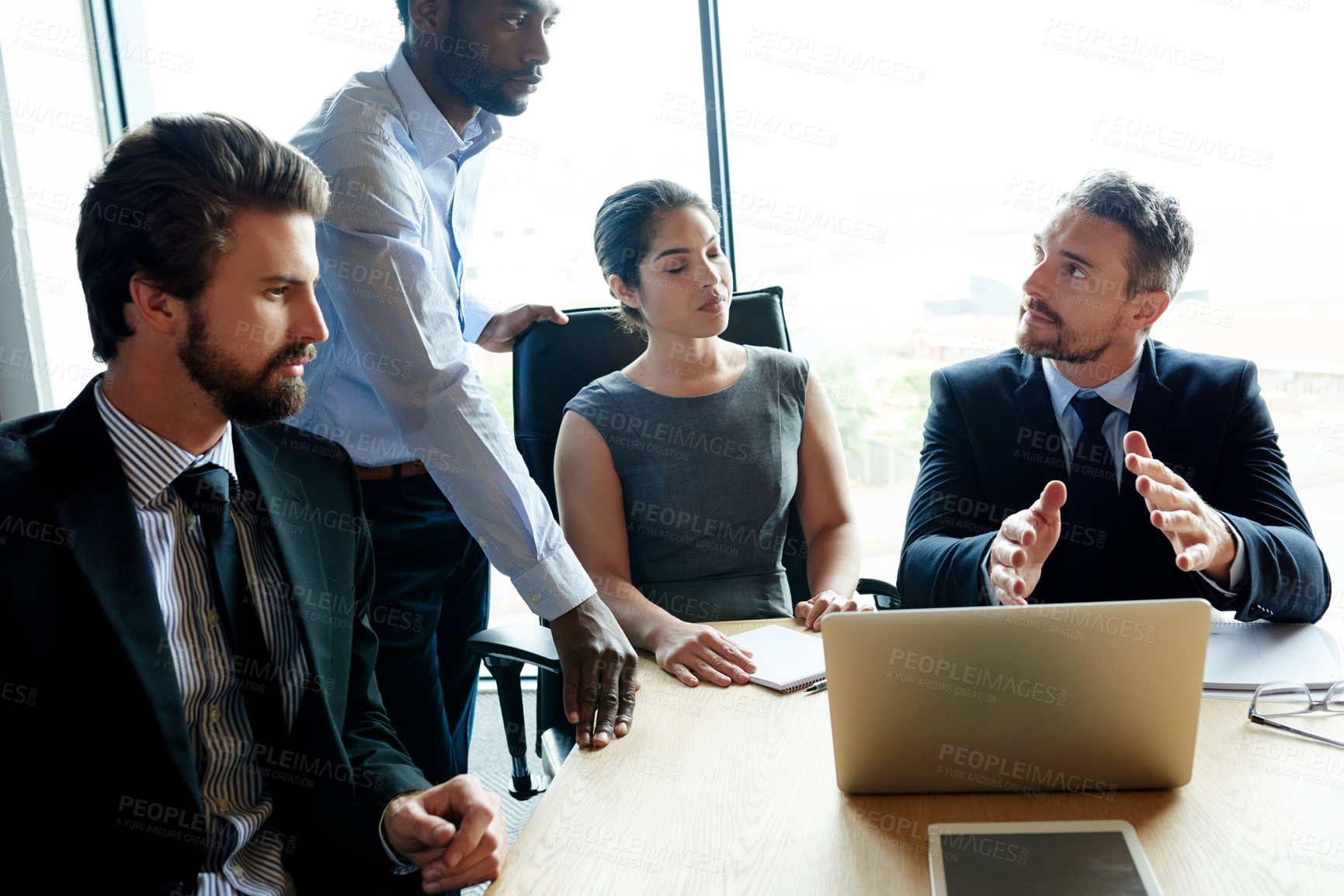 Buy stock photo Thinking, talking and leadership team collaboration of business workers in a boardroom meeting. Serious office group work together on finance strategy. Corporate investment team working on a project