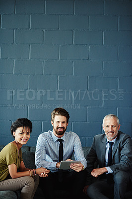 Buy stock photo Portrait of a group of coworkers working together with a digital tablet