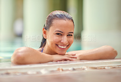 Buy stock photo Woman, portrait and relax with smile by pool side for summer holiday, peace and weekend getaway. Happy, female person and face by water at hotel for vacation, swimming and tourist resort in Greece