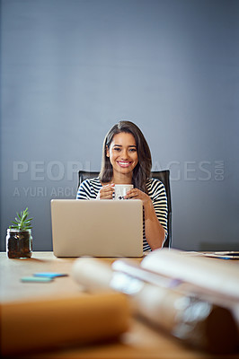 Buy stock photo Shot of a businesswoman working on her laptop in the office