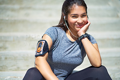 Buy stock photo Happy woman, portrait and fitness with earphones on steps for break, relax or listening to music in city. Female person with smile or headphones on stairs for podcast, playlist or audio after workout