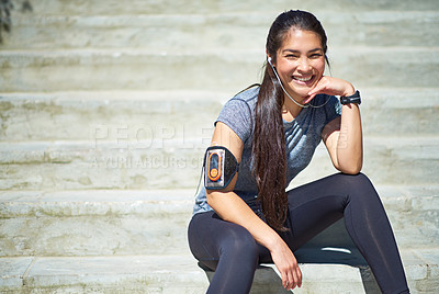 Buy stock photo Happy woman, portrait and fitness with earphones for music, break or relax on stairs in city. Female person with smile or headphones on stairs for podcast, playlist or audio after workout or exercise