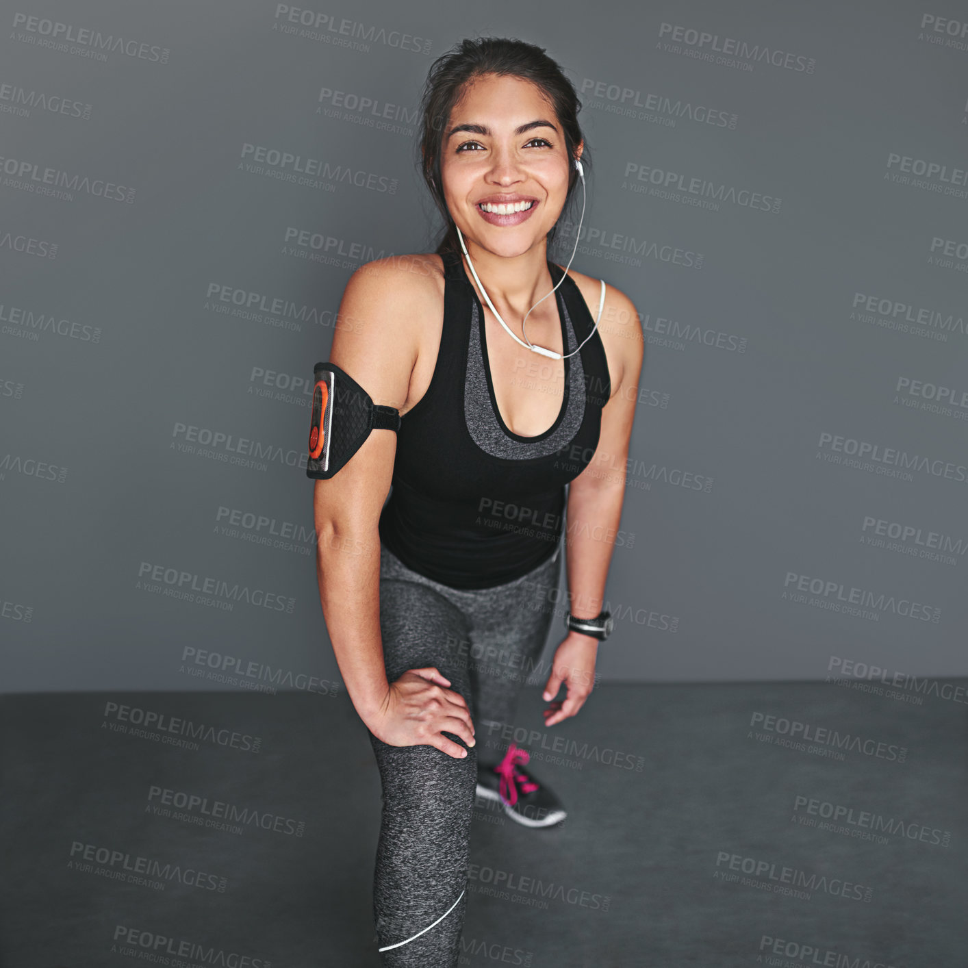 Buy stock photo Fitness, music and portrait of woman with headphones for wellness, healthy body and streaming audio in studio. Sports, podcast and happy person for exercise, training and workout on gray background