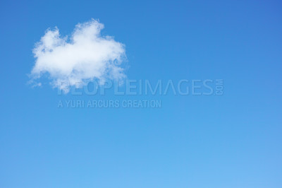 Buy stock photo Copyspace of clear blue sky with white fluffy clouds from below. Scenic and vibrant panoramic of cumulus cloudscape background. Affects of weather on earth due to climate change in natural environment