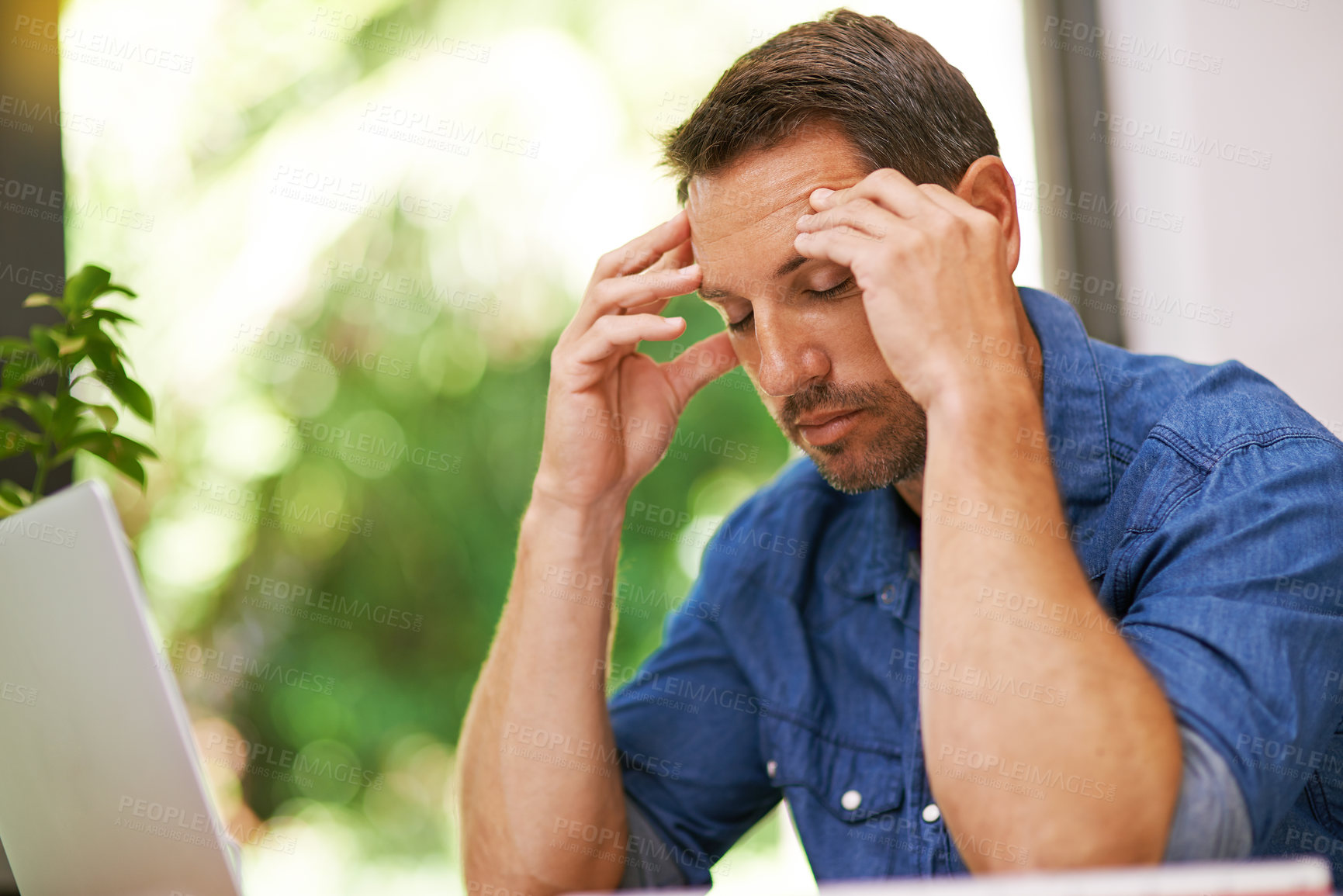 Buy stock photo Stress, remote work and man in home on laptop for budget, financial review and mortgage payment. Thinking, computer and frustrated person with headache for insurance, investment and finance bills